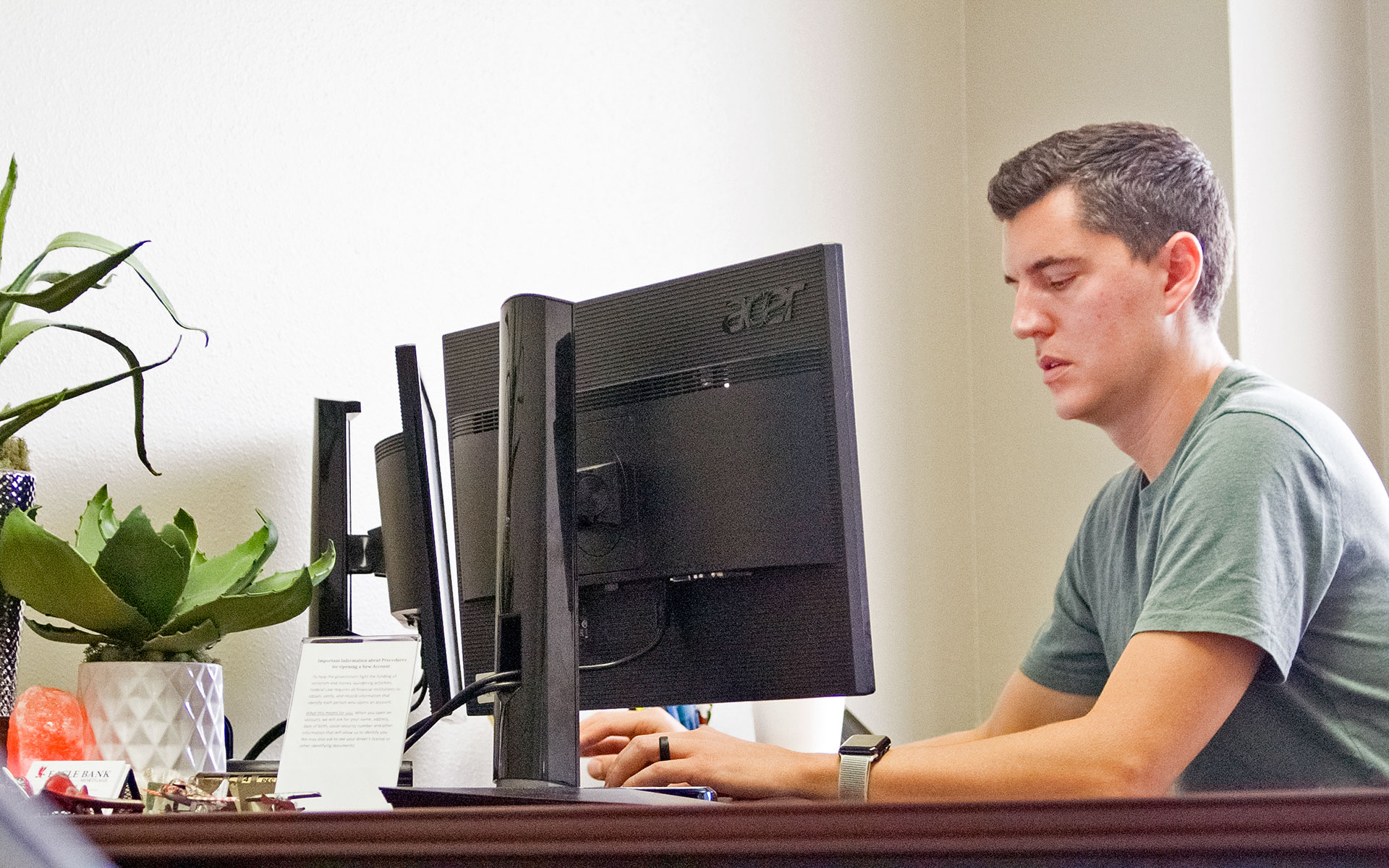 Jake Arey at his desk